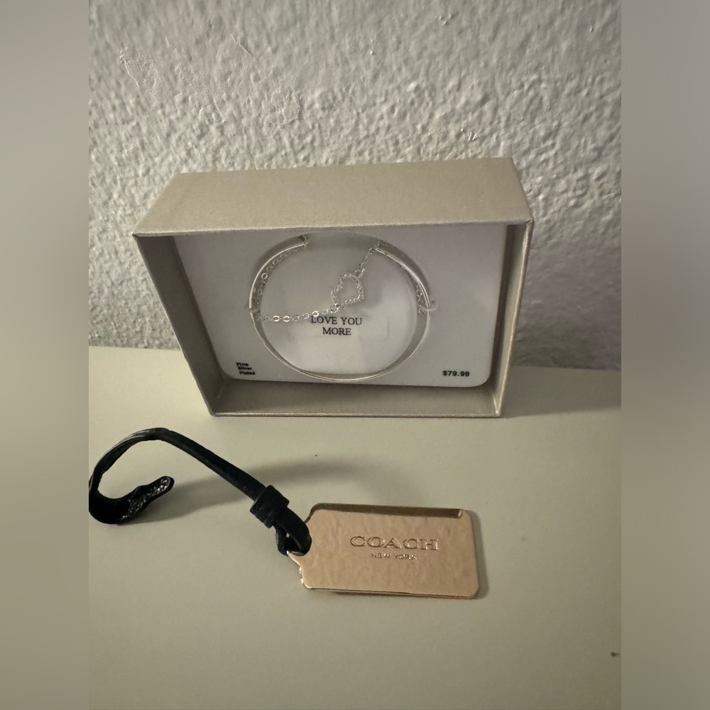 NWT silver plated bracelet w/attached charm, coach charm, & leather purse charm - Picture 15 of 16
